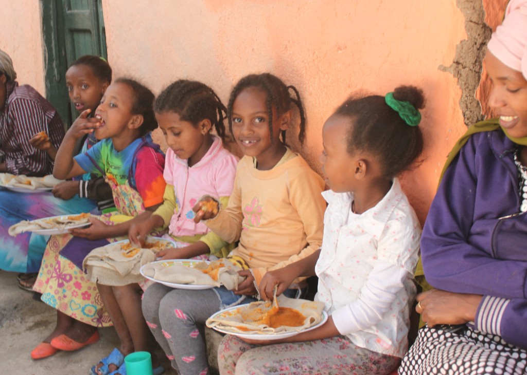 Children sharing a meal together